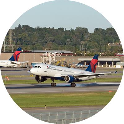 Image of a Delta jet taking off at the Twin Cities International Airport